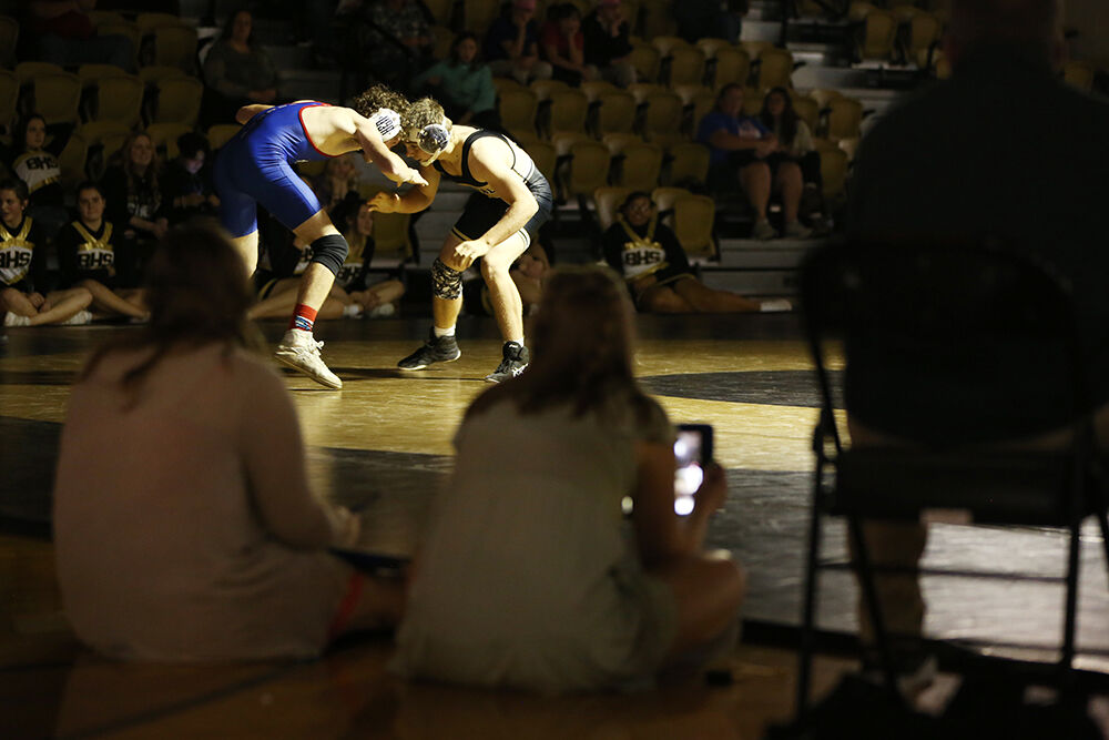 Zander Tass pushes Douglas opponent Andrew Gifford